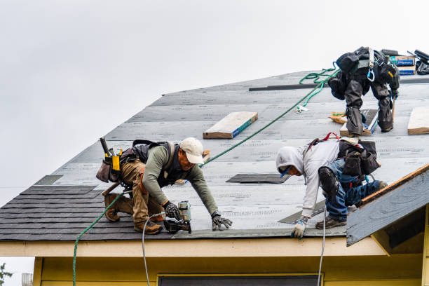 Professional Gutter Installation technician working in Paramount, CA